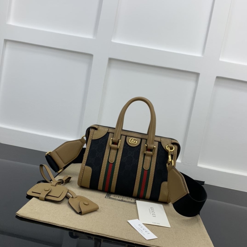 G*u*i top handle bags